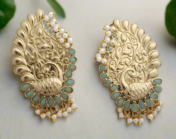 Peacock motif earrings in gold finish