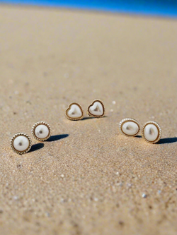 Timeless elegance: Classic pestle stud earrings with decorative bezels