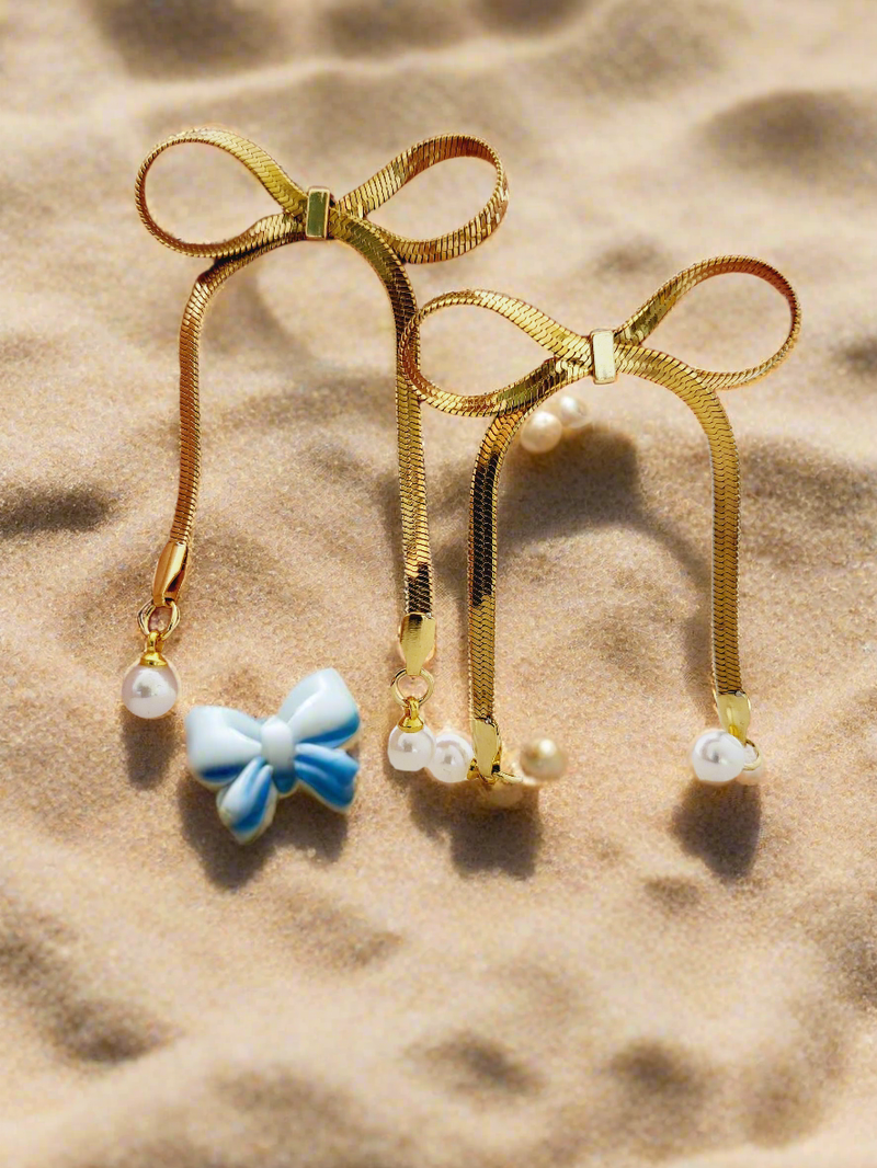 Whimsical & Elegant Bow & pearl drop earrings