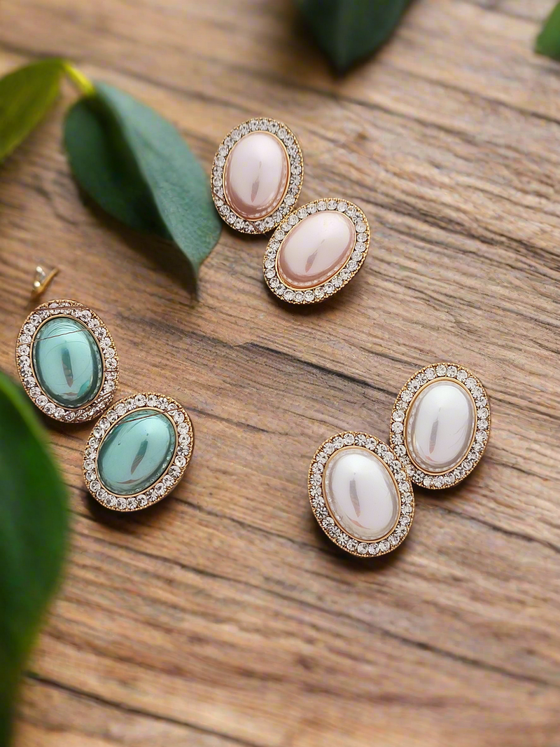 Classic pearl studs with diamonds