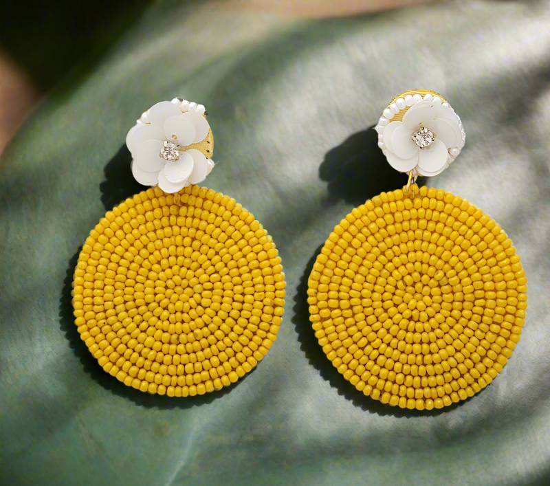 Beaded Circle Earrings with White Flower Accents