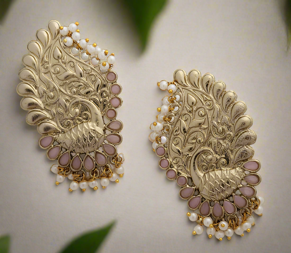 Peacock motif earrings in gold finish