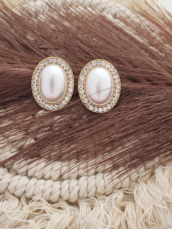 Classic pearl studs with diamonds